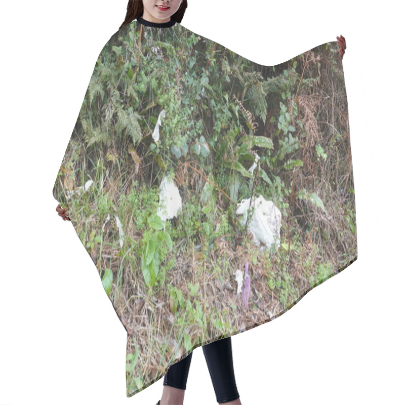 Personality  Plastic Bags And Other Non-biodegradable Waste Pollute A Forest Floor, Highlighting The Impact Of Human Activity On The Environment Hair Cutting Cape