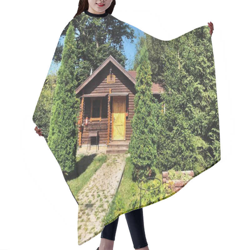 Personality  Log House In The Forest. Log House In The Forest. Wooden House Among The Trees.  Hair Cutting Cape