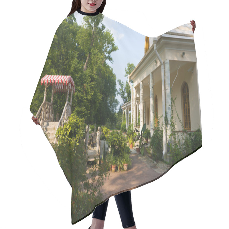 Personality  Back Yard With Plants And An Awning On A Dais Hair Cutting Cape