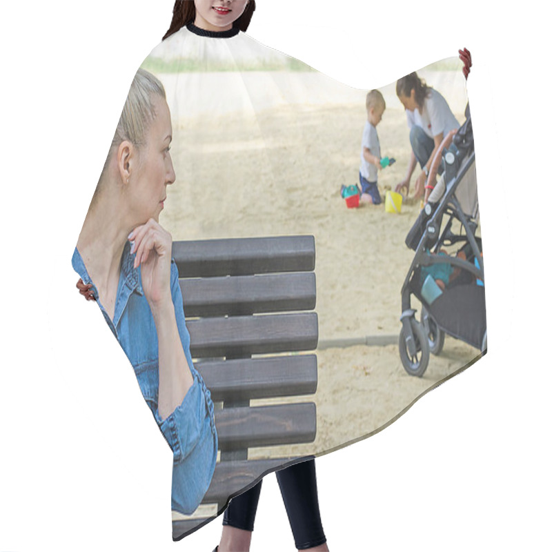 Personality  A Woman Suffers From Infertility, Sits Sad On The Playground, Watches Her Mother Play In The Background. Infertility, Abortion, Postpartum Depression. Hair Cutting Cape