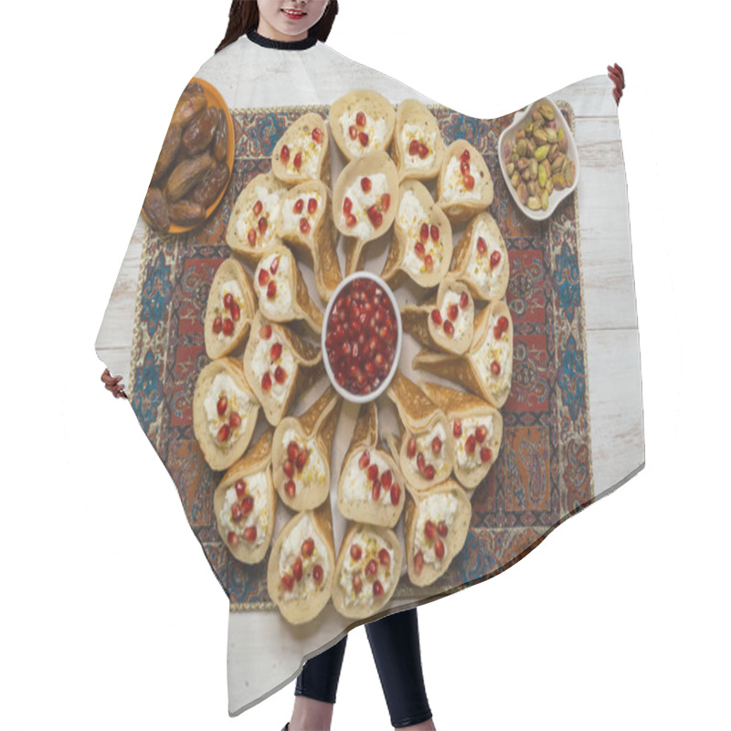 Personality  Arabian Pancake Stuffed With Sweet Cheese.  Hair Cutting Cape