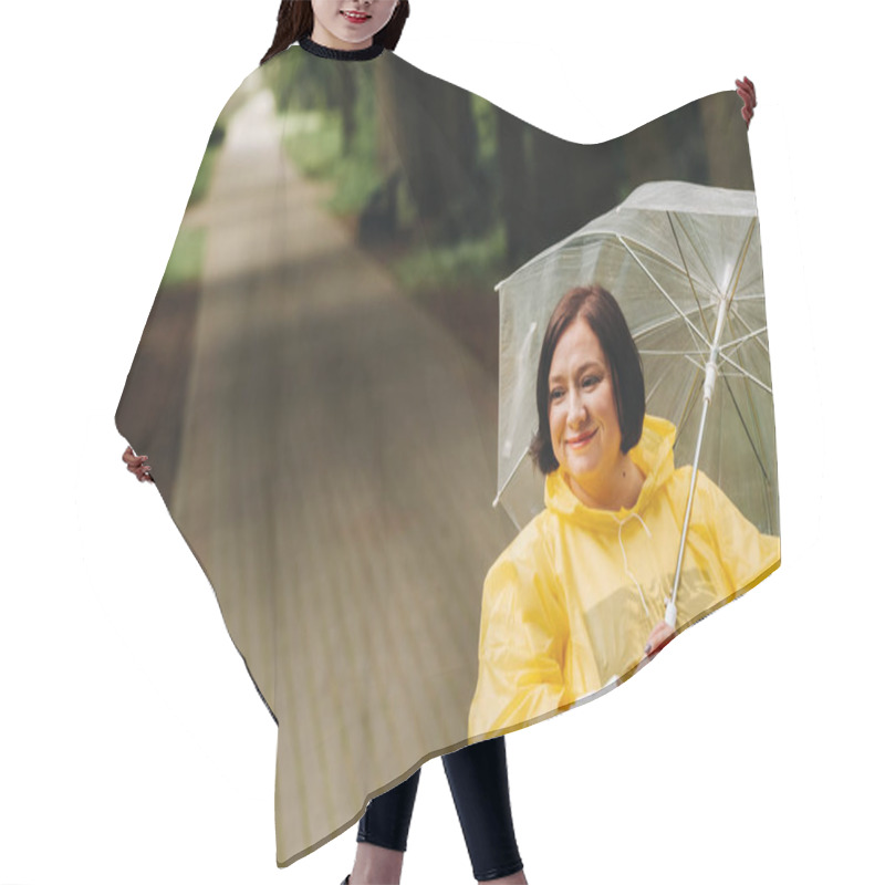 Personality  A Woman In A Yellow Raincoat And An Umbrella Walks In The Park And Garden In Summer. Hair Cutting Cape