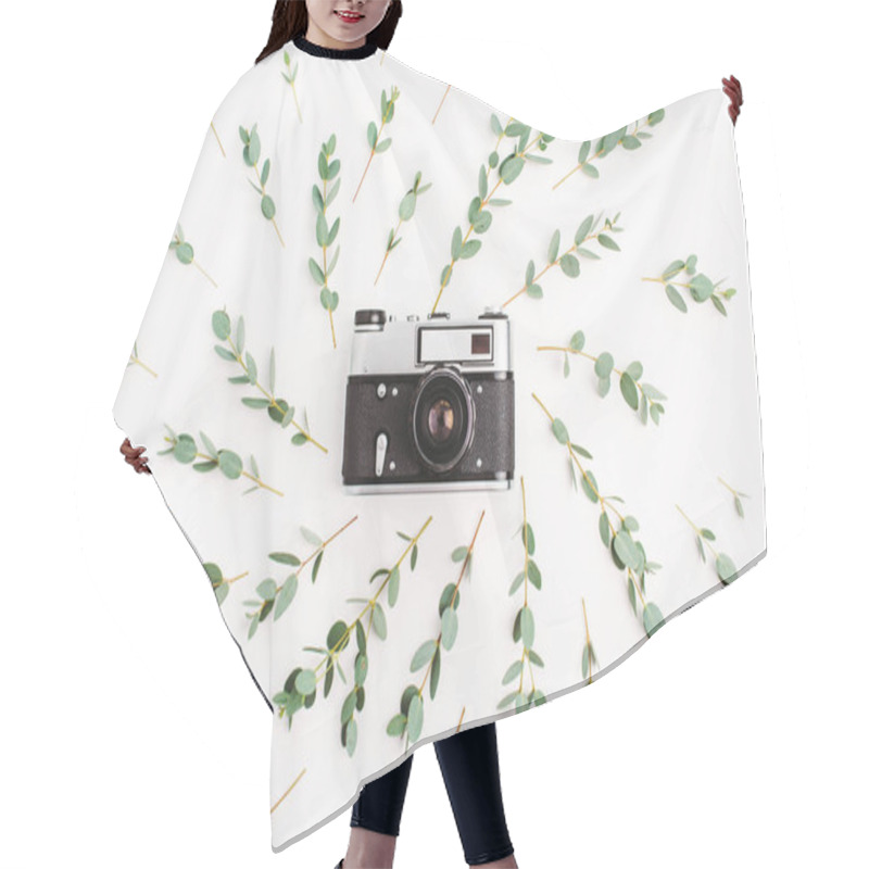 Personality  Flat Lay, Top View Minimal Composition With Retro Photo Camera In Frame Of Eucalyptus Branch On White Background. Photographer Concept. Hair Cutting Cape