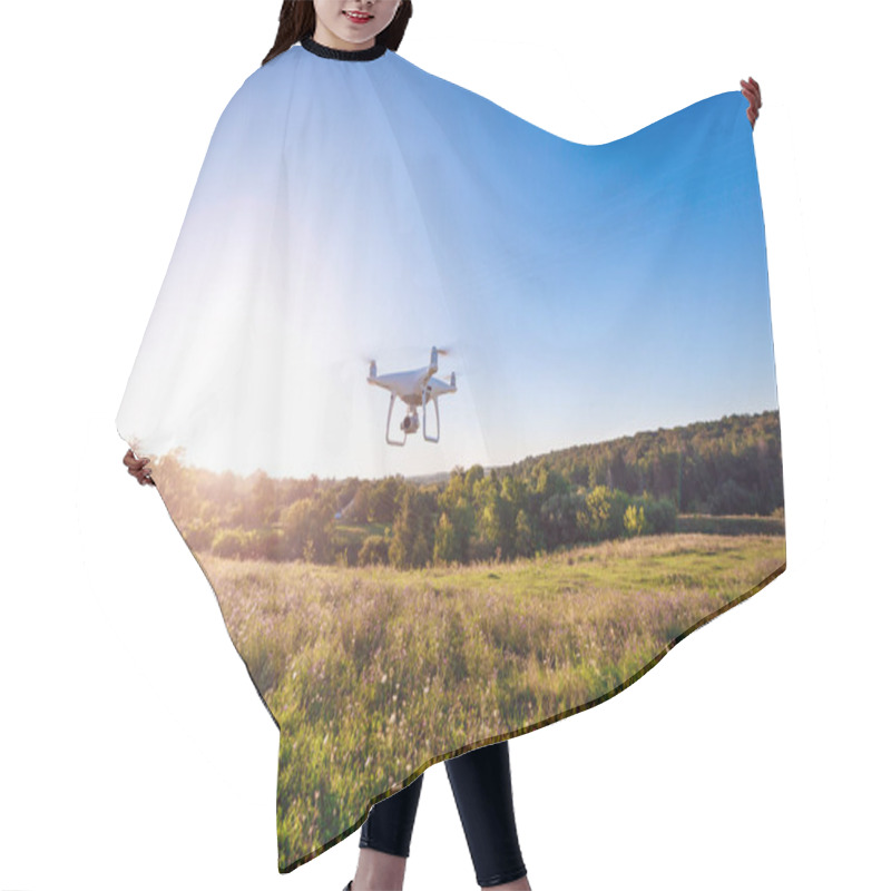 Personality  Close Up On White Drone Camera. Drone Quadcopter In Flight Hair Cutting Cape