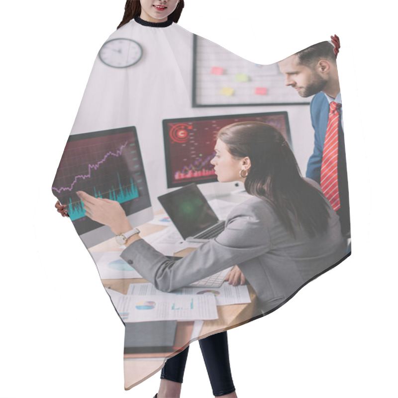 Personality  Side View Of Data Analyst Pointing With Hand At Graphs On Computer Monitor To Colleague In Office Hair Cutting Cape