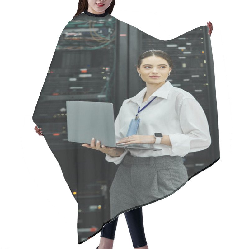 Personality  A Woman In A White Shirt Works On Her Laptop In A Modern Server Room, Ensuring Security. Hair Cutting Cape