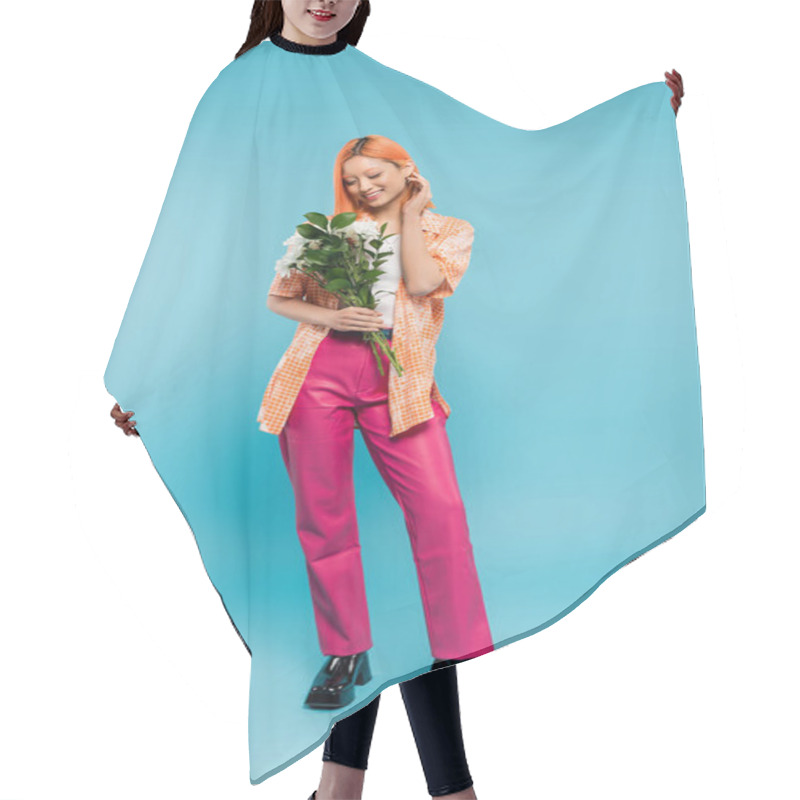 Personality  Positive Vibes, Cheerful Asian Woman With Red Hair Holding White Flowers On Blue Background, Casual Attire, Generation Z, Floral Bouquet, Happy Face, Generation Z, Youth Culture, Full Length  Hair Cutting Cape