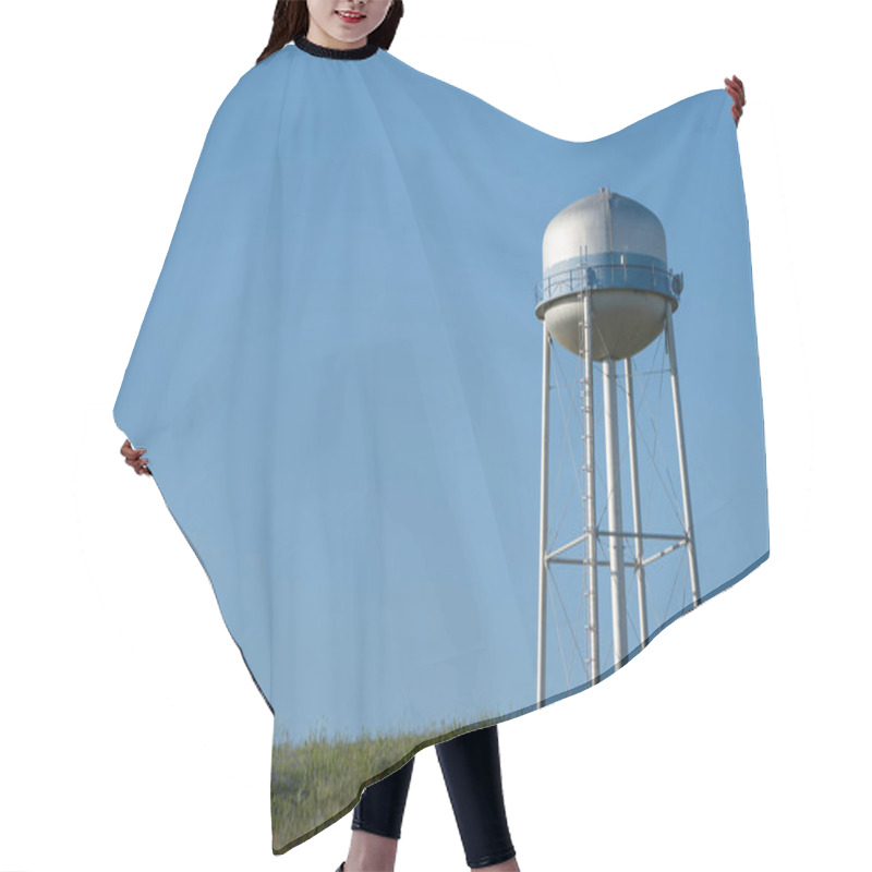 Personality  Watertower In A Field Against A Blue Sky.  Hair Cutting Cape