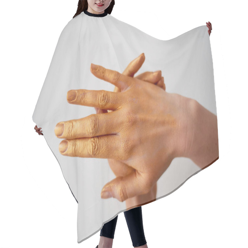 Personality  Hands With Long Fingers In Gold Paint.Hand Care Hair Cutting Cape