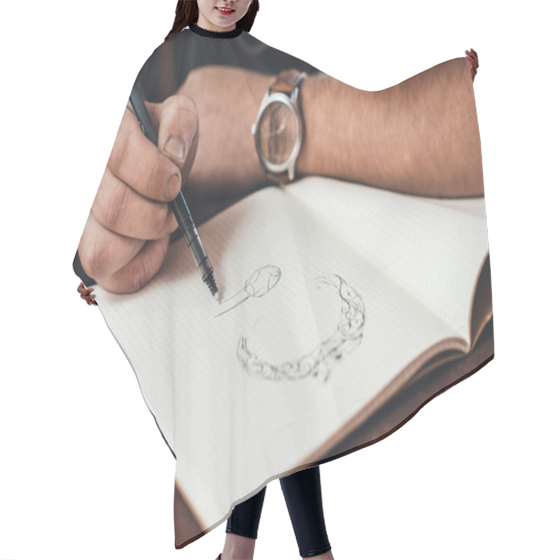 Personality  Jeweler Sketching Out New Jewelry Designs Hair Cutting Cape