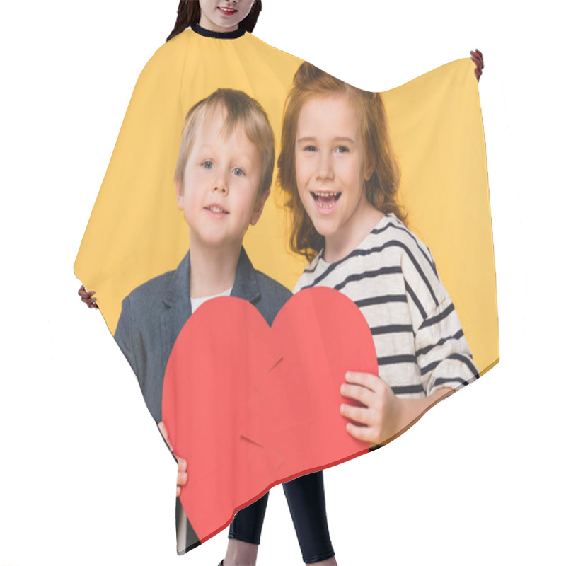 Personality  Portrait Of Kids Holding Red Paper Heart Together Isolated On Yellow, St Valentines Day Concept Hair Cutting Cape