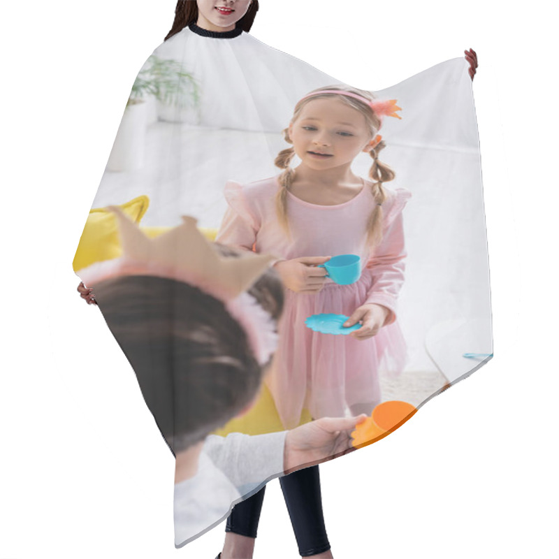 Personality  Back View Of Man In Toy Crown Near Daughter Playing Princess At Home, Blurred Foreground Hair Cutting Cape