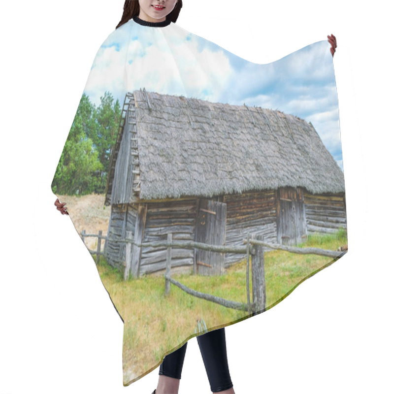 Personality  Folk abandoned oldest habitation under a reed roof in the disappearing village of Svalovichi in the Ukraine. Ukrainian Polissya. hair cutting cape