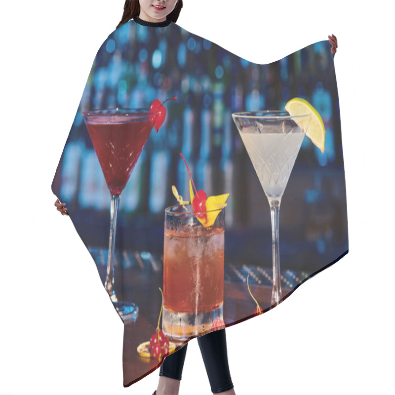 Personality  Refreshing Martini, Negroni And Cosmopolitan On Bar Counter With Fresh Berries, Concept Hair Cutting Cape