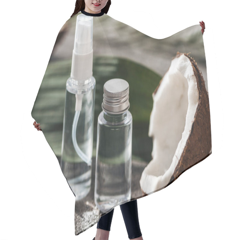 Personality  Selective Focus Of Bottles With Coconut Water Near Coconut Half And Palm Leaf On Grey Textured Background Hair Cutting Cape