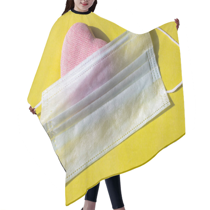 Personality  Photo Shows A Red Heart On Yellow Background,with A Disposable Mask On It. Protect Yourself And Your Loved Ones From The Coronavirus.Self-isolation Of The House For The Safety Of The People In World Hair Cutting Cape