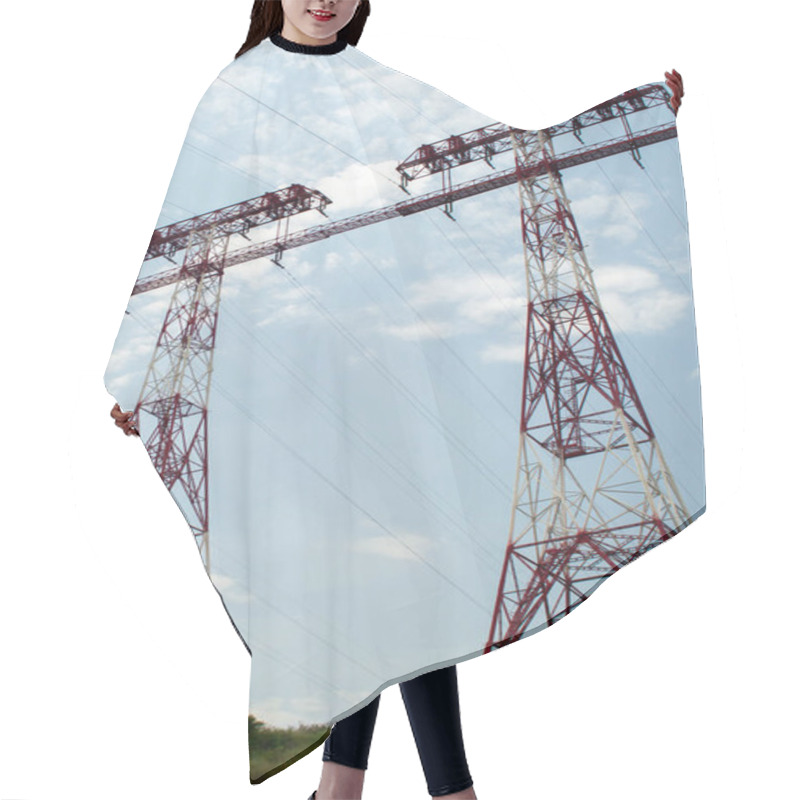 Personality  Two Tall Electricity Pylons With Red And White Lattice Structures, Set Against A Clear Sky. Perfect For Illustrating Power Distribution, Energy Infrastructure, And Industrial Themes. Hair Cutting Cape