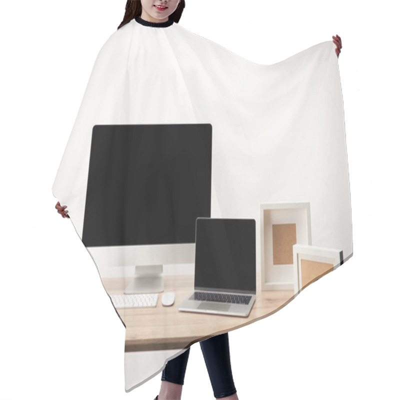 Personality  Workplace With Photo Frames, Desktop Computer And Laptop With Copy Space On Wooden Table Isolated On White Hair Cutting Cape