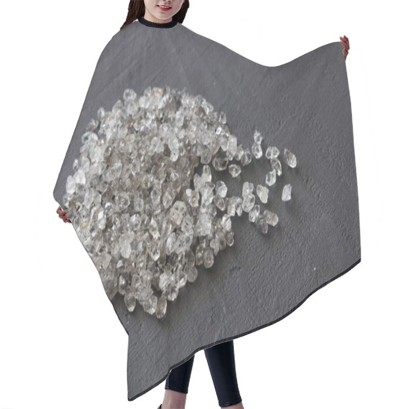 Personality  Scattered Diamonds On A Black Background. Raw Diamonds And Minin Hair Cutting Cape