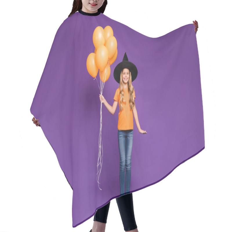 Personality  Full Size Photo Of Little Witch Lady Halloween Party Holding Many Air Balloons Came To Children Theme Party Wear Orange T-shirt Wizard Hat Isolated Purple Color Background Hair Cutting Cape