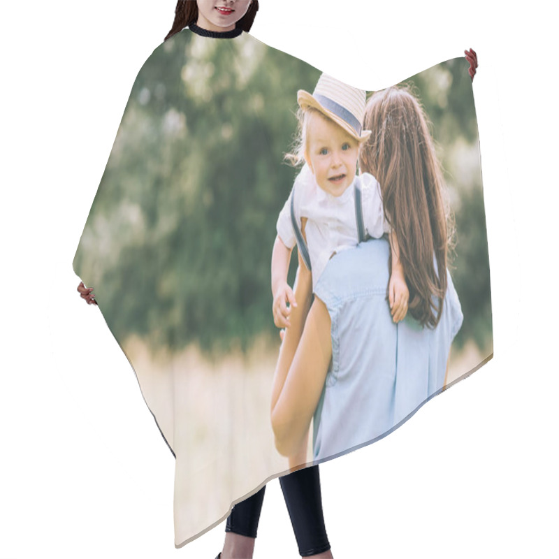 Personality  Stylish Mother Holding Baby Boy On Hands And Walking In Field Hair Cutting Cape