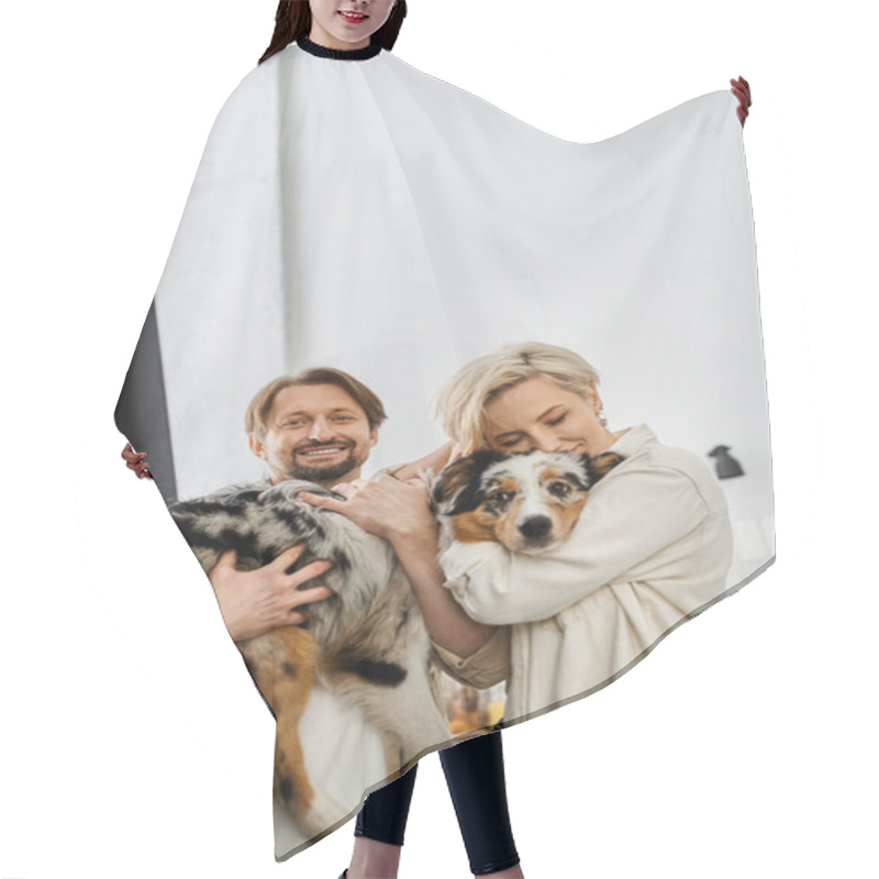 Personality  A Couple Shares A Tender Moment While Cuddling Their Beloved Pet In The Comfort Of Their Home. Hair Cutting Cape