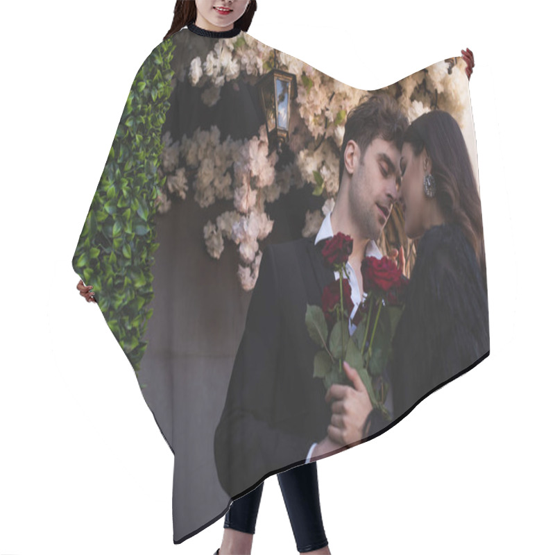 Personality  Man Holding Red Roses Near Woman In Faux Fur Jacket Near Blooming Flowers On Wall Hair Cutting Cape