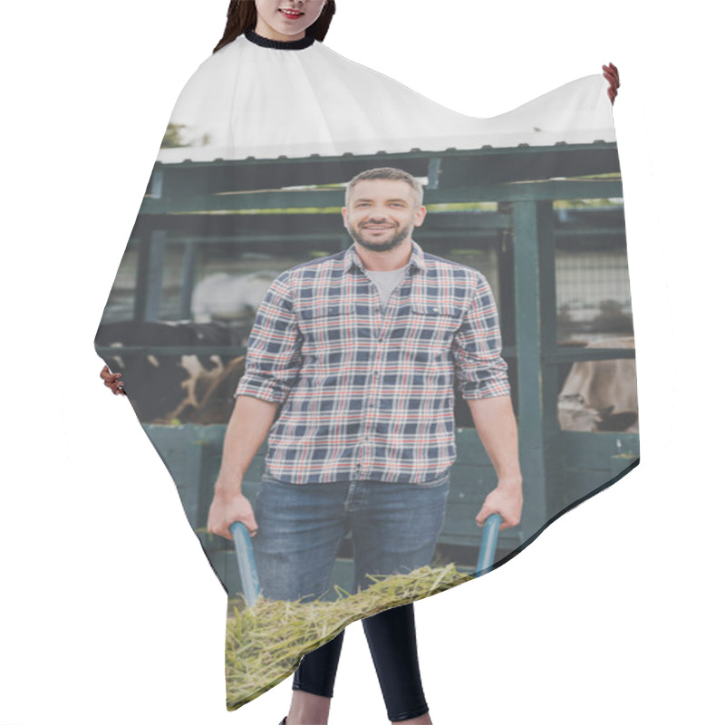 Personality  Farmer Holding Wheelbarrow With Grass And Smiling At Camera While Working At Cowshed Hair Cutting Cape