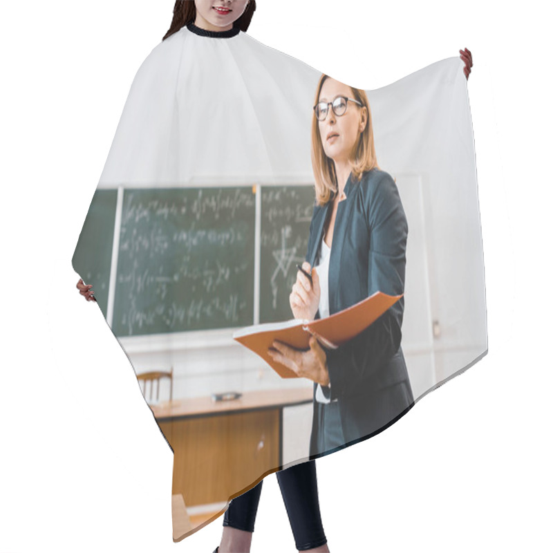 Personality  Beautiful Female Teacher In Formal Wear And Glasses Holding Notebook In Classroom Hair Cutting Cape