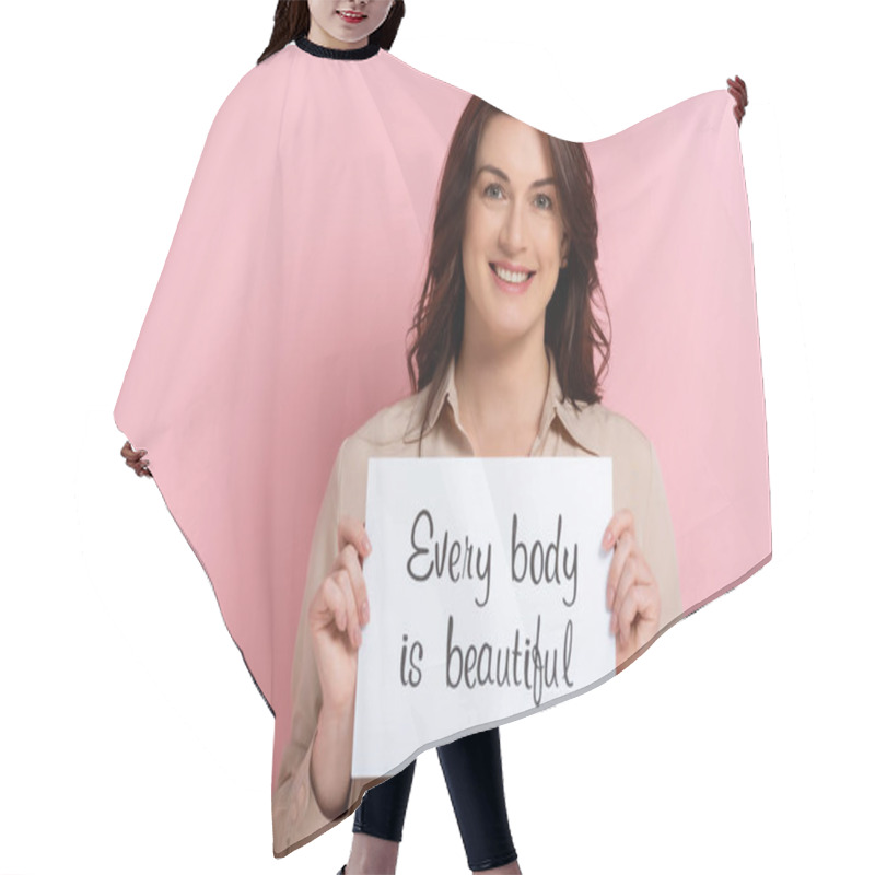 Personality  Beautiful Smiling Woman Holding Card With Every Body Is Beautiful Lettering On Pink Background Hair Cutting Cape