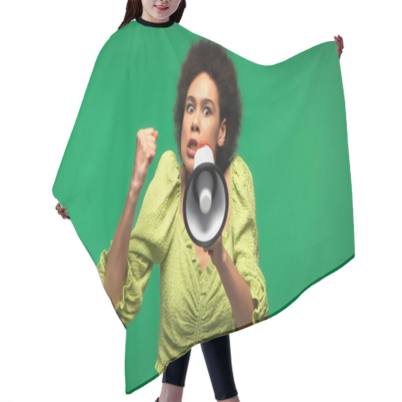 Personality  Angry African American Woman Protesting While Holding Loudspeaker And Looking At Camera Isolated On Green  Hair Cutting Cape