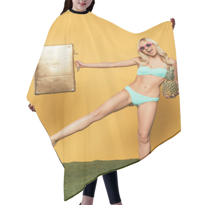 Personality  Joyful, Attractive Blonde Girl In Swimsuit Standing On One Leg While Holding Vintage Suitcase And Whole Pineapple On Yellow Background Hair Cutting Cape