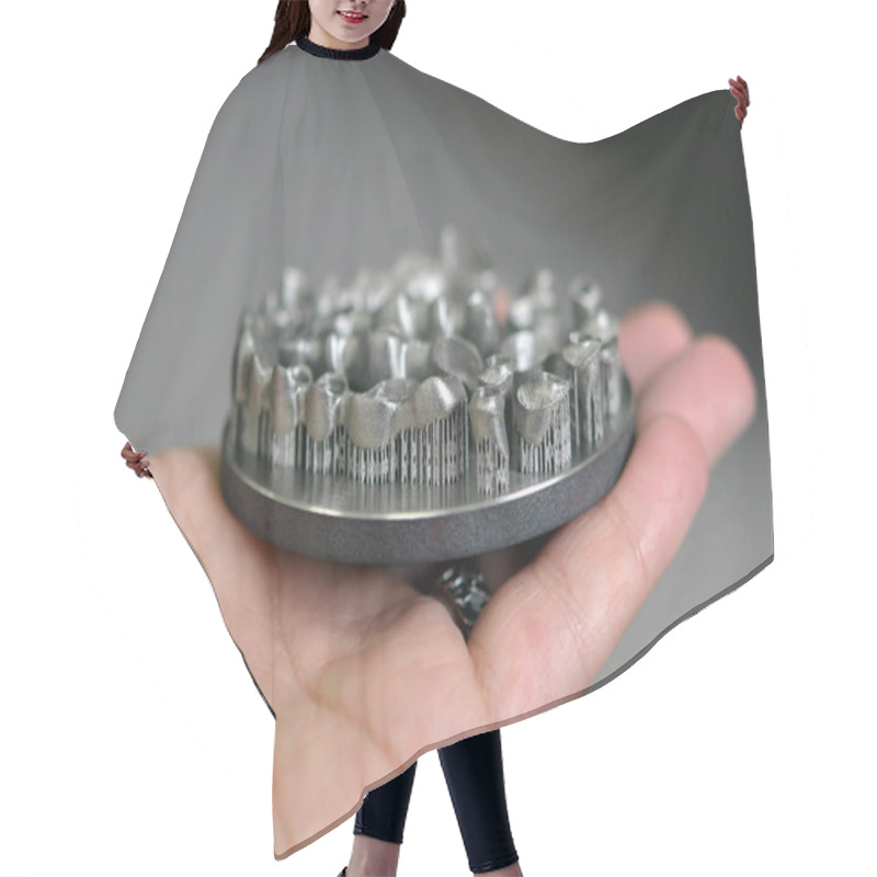 Personality  Man Is Holding Object Printed On Metal 3d Printer. Hair Cutting Cape