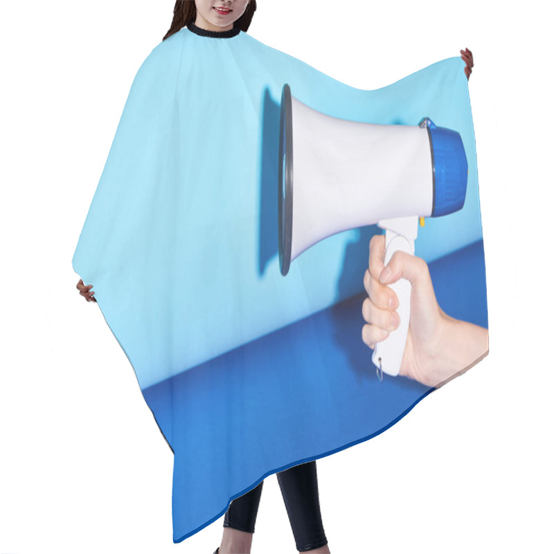 Personality  Cropped View Of Woman Holding Loudspeaker On Turquoise Background  Hair Cutting Cape