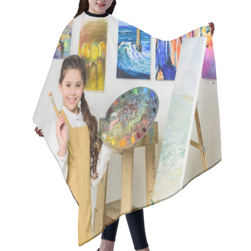 Personality  Smiling Kid Holding Painting Brush And Canvas In Workshop Of Art School Hair Cutting Cape