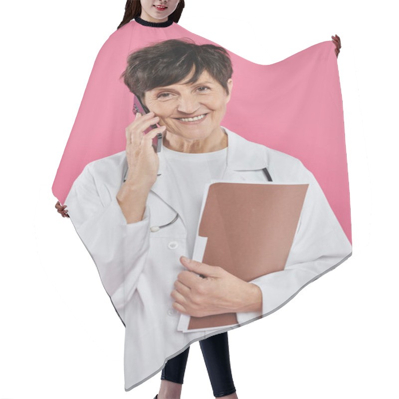 Personality  Mature Oncologist, Female Doctor Holding Folder And Talking On Smartphone, Breast Cancer Awareness Hair Cutting Cape