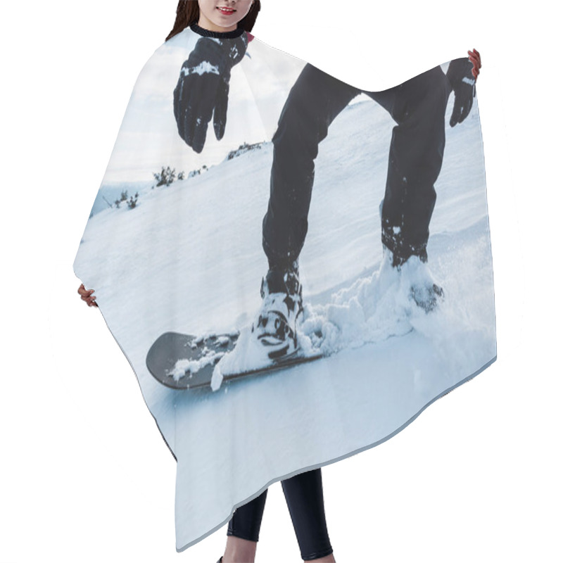 Personality  Cropped View Of Snowboarder In Gloves Riding On Slope With White Snow In Wintertime  Hair Cutting Cape