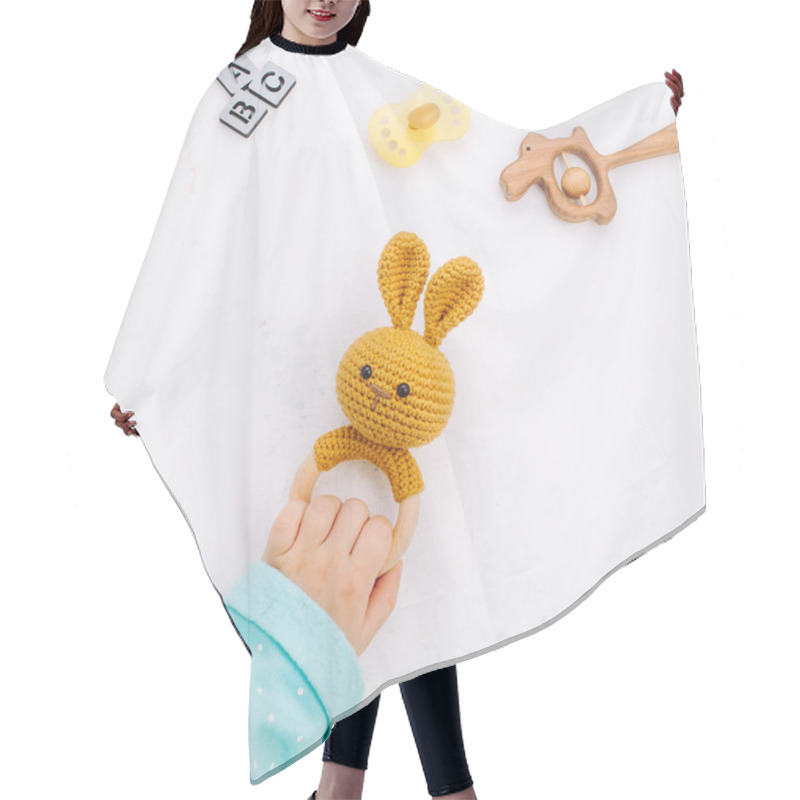 Personality  Kids Hand Holding Bunny Beanbag On Light Marble Background Hair Cutting Cape