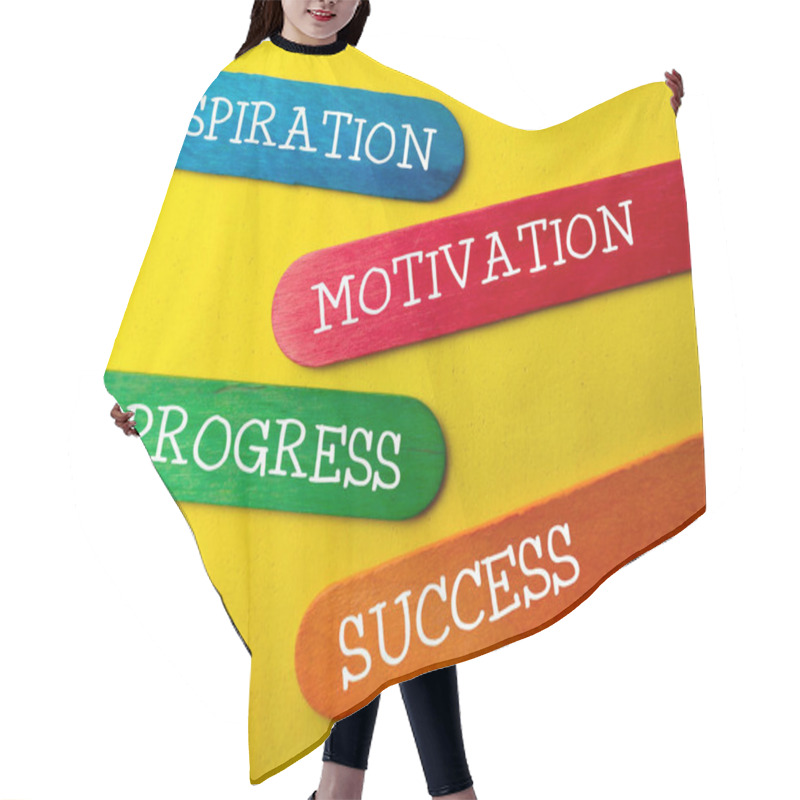 Personality  Word INSPIRATION MOTIVATION PROGRESS SUCCESS On A Yellow Background Hair Cutting Cape