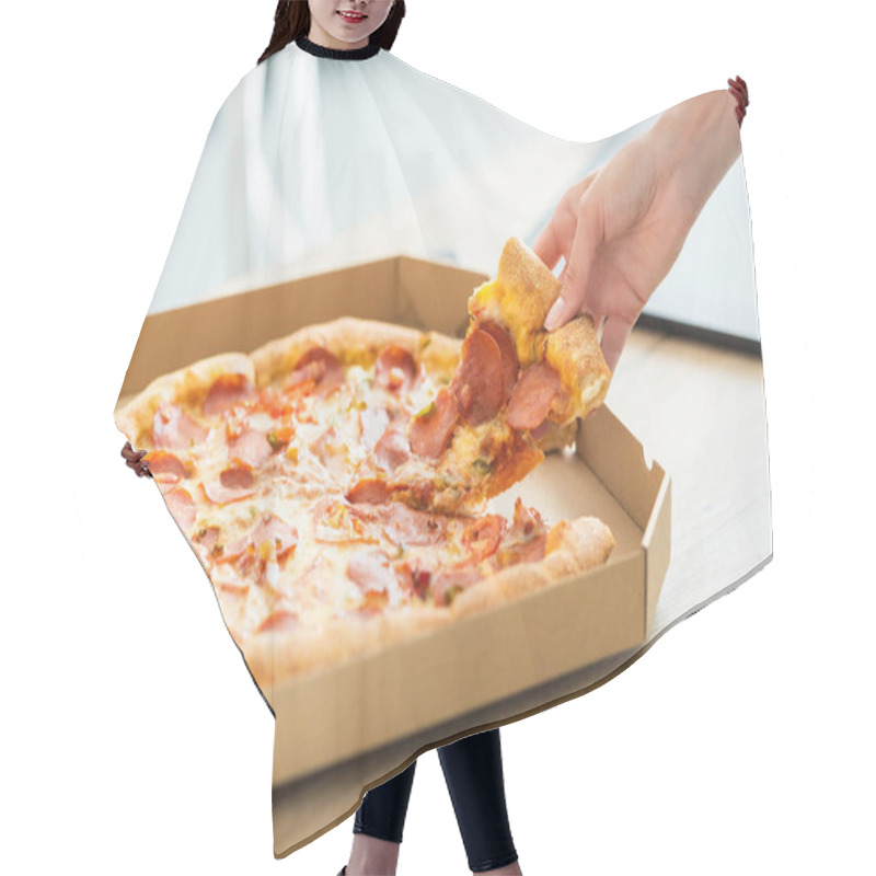 Personality  Cropped Image Of Woman Taking Pizza Slice From Box At Table  Hair Cutting Cape