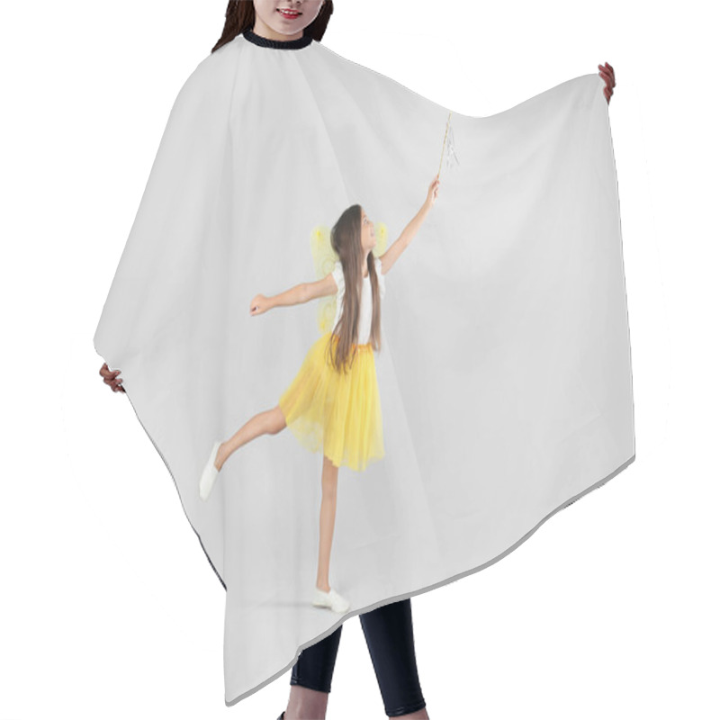 Personality  Cute Little Girl In Fairy Costume With Yellow Wings And Magic Wand On Light Background Hair Cutting Cape