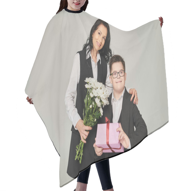 Personality  Elegant Woman And Boy With Down Syndrome With Flowers An Gift Box Smiling On Grey, Special Family Hair Cutting Cape