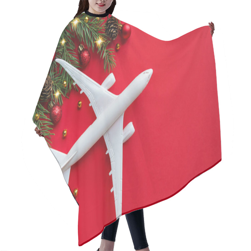 Personality  Christmas Travel Concept. Christmas Background On The Theme Of Travel. The Plane Symbolizes The Gift Of Travel. Holiday Hair Cutting Cape