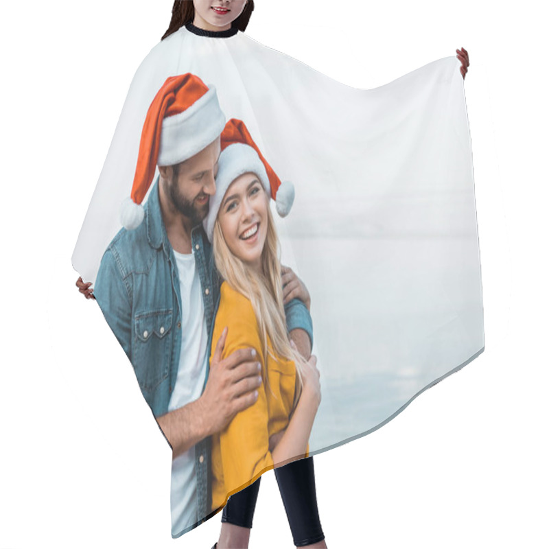 Personality  Smiling Boyfriend In Santa Hat Hugging Girlfriend On Beach Hair Cutting Cape