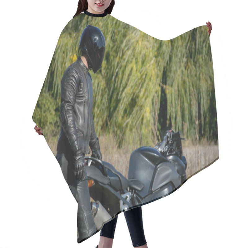 Personality  The Motorcyclist In Black Wearing A Helmet Looks At A Motorcycle Hair Cutting Cape