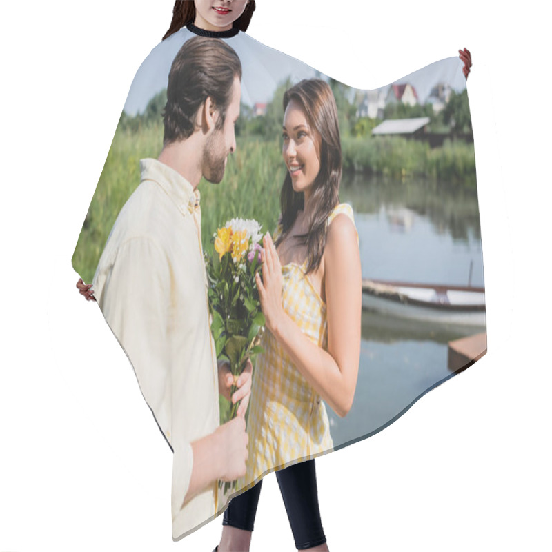 Personality  Bearded Man Holding Bouquet Of Flowers Near Happy Woman In Dress Near Lake  Hair Cutting Cape