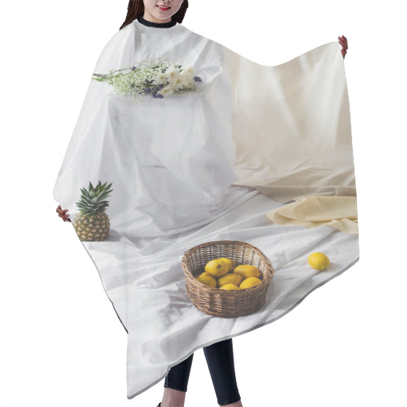 Personality  Ripe Lemons In Wicker Basket Near Pineapple On White Bed Sheets Near Bouquet Of Flowers  Hair Cutting Cape