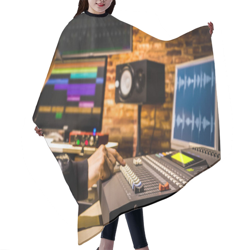 Personality  Asian Male Professional Sound Engineer Working In Digital Recording, Broadcasting, Editing Studio. Focus On Mixer Fader Hair Cutting Cape