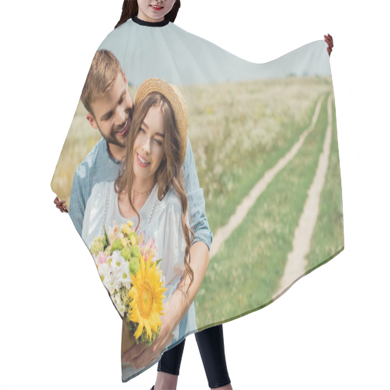 Personality  Portrait Of Smiling Man Hugging Girlfriend With Bouquet Of Wild Flowers In Summer Field Hair Cutting Cape