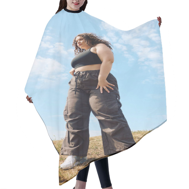 Personality  A Joyful Plus Size Woman Stands Tall In A Field, Embracing Nature Under A Bright Sky. Hair Cutting Cape